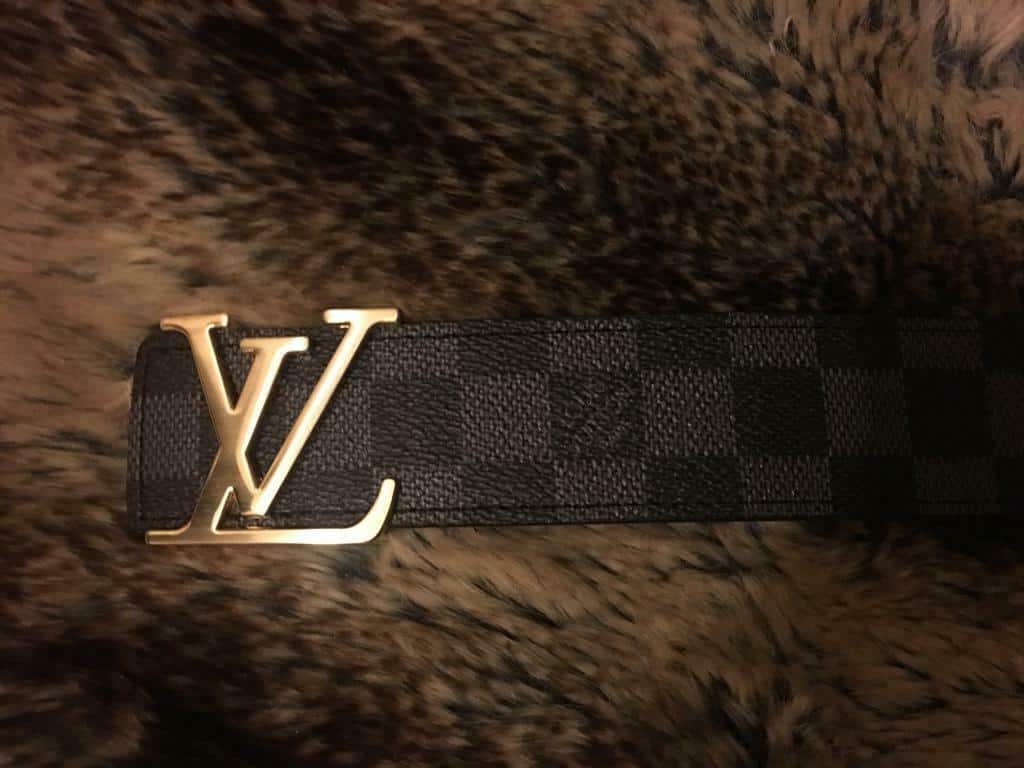white and gold louis vuittons belt