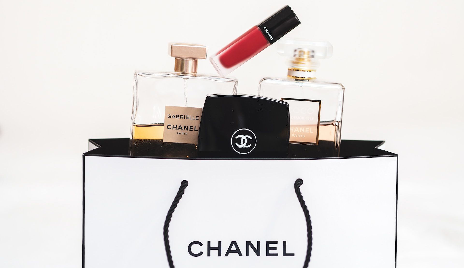Chanel perofumes in a shopping bag