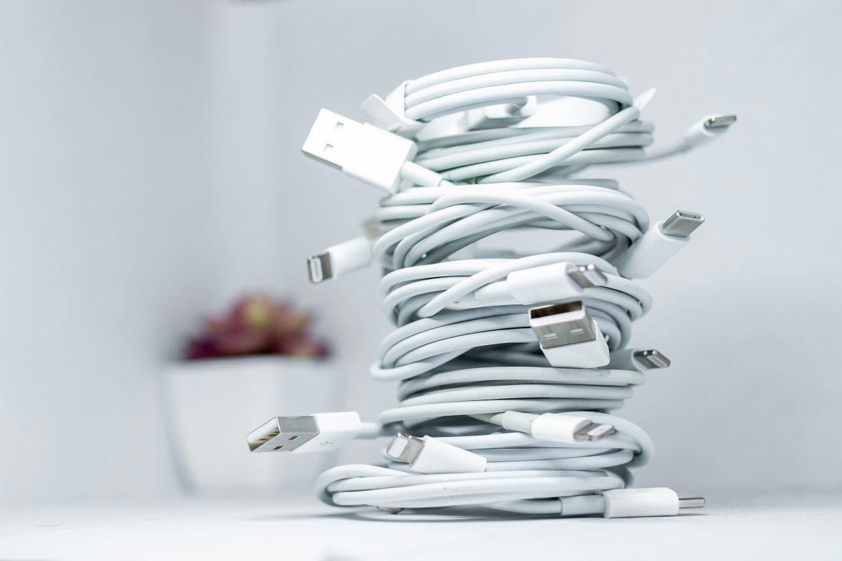 A few Apple Lighting to USB cables stacked on top of each other