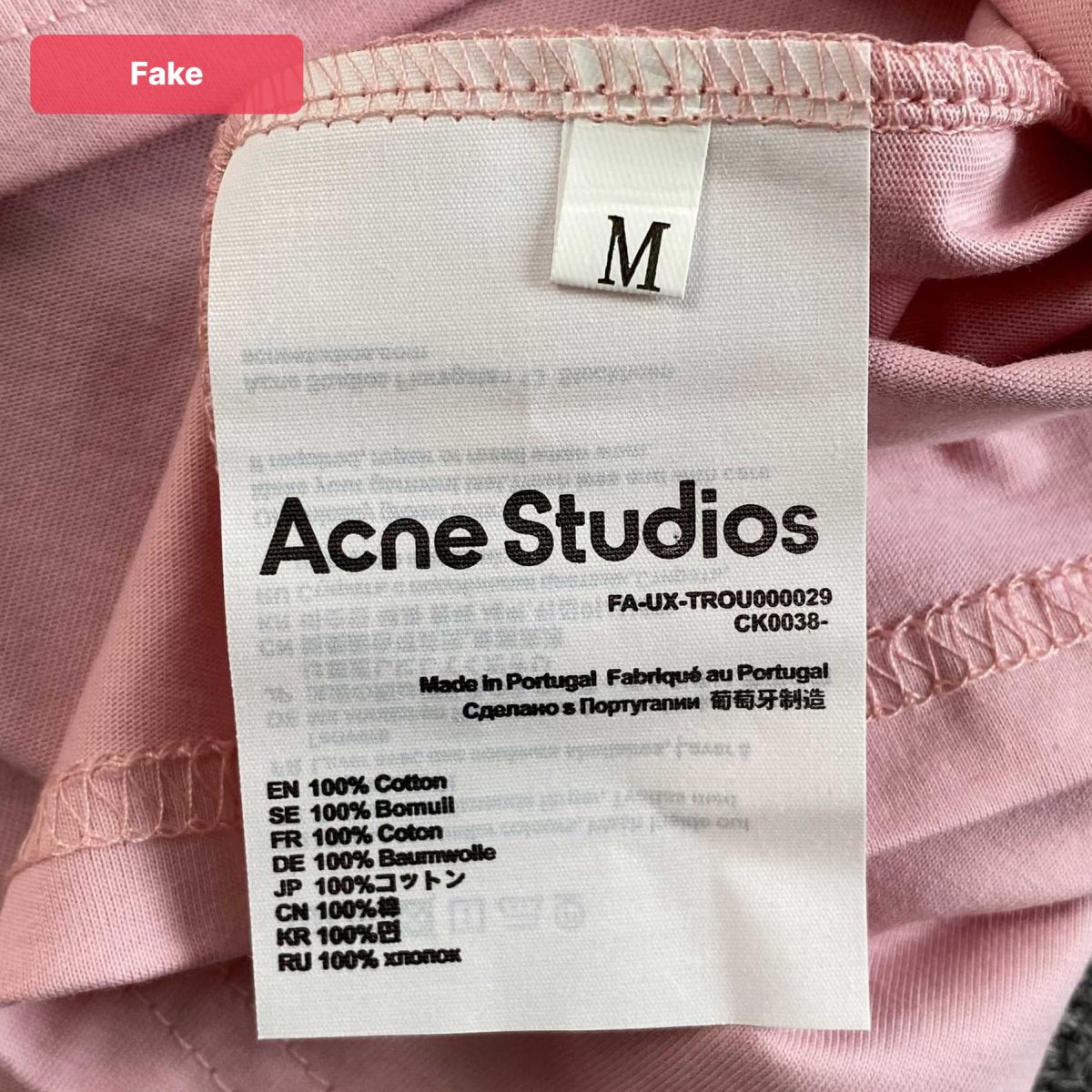 Example of a fake wash tag from a Acne Studios t-shirt